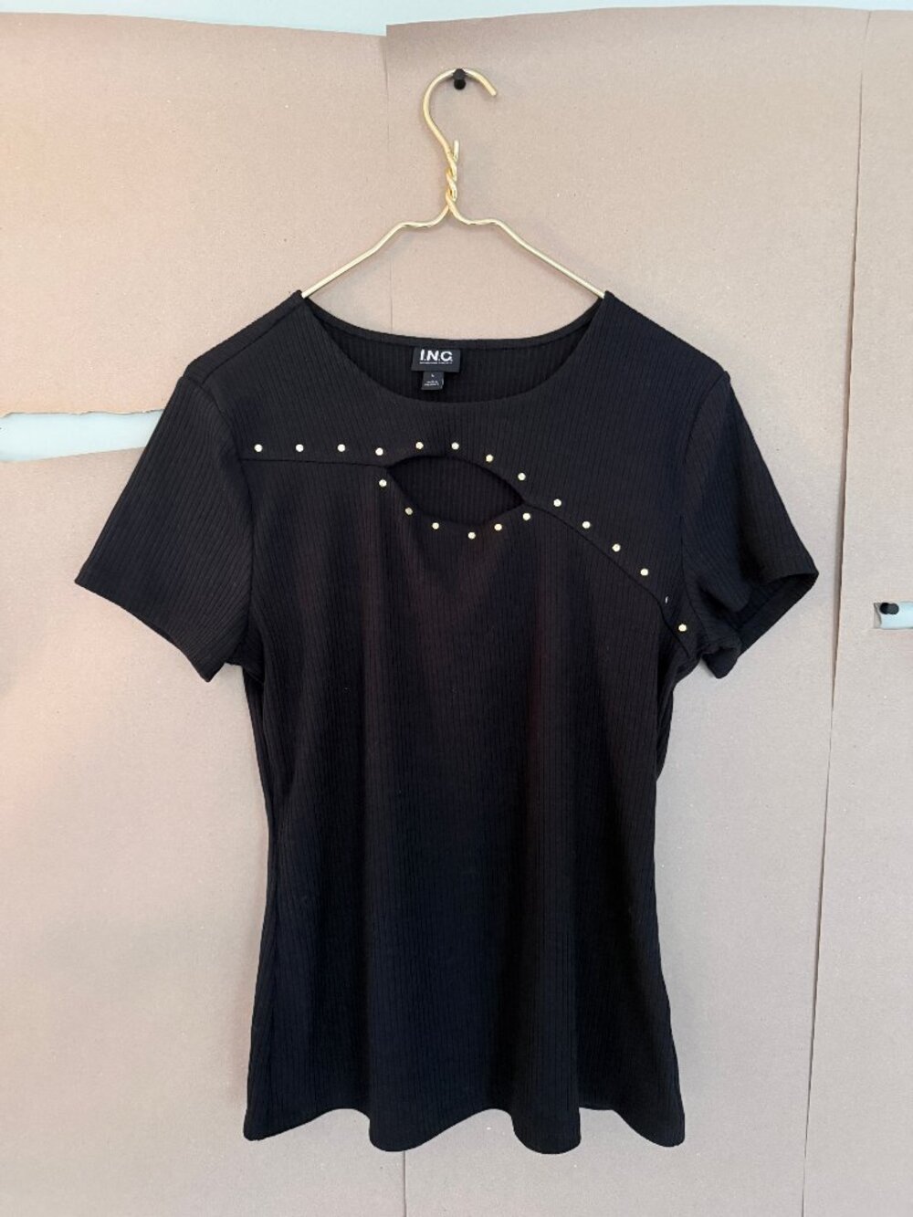 Elevated black ribbed t with peekaboo cutout and rivet detailing, INC, size L